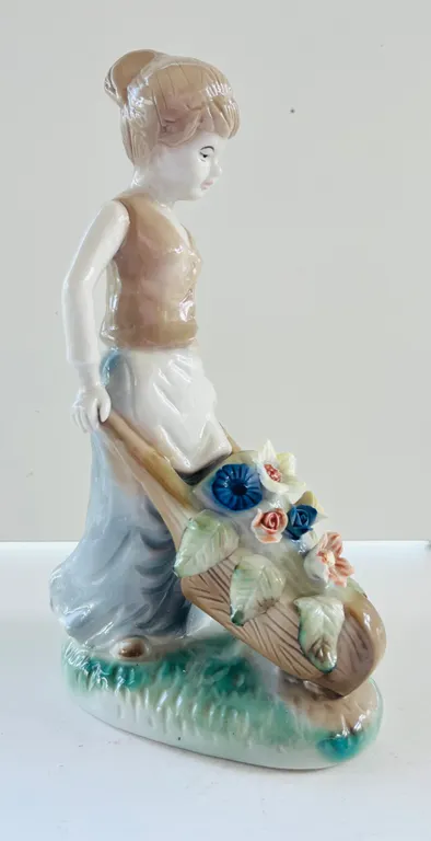 Porcelain Figurine Woman with Wheelbarrow of Flowers