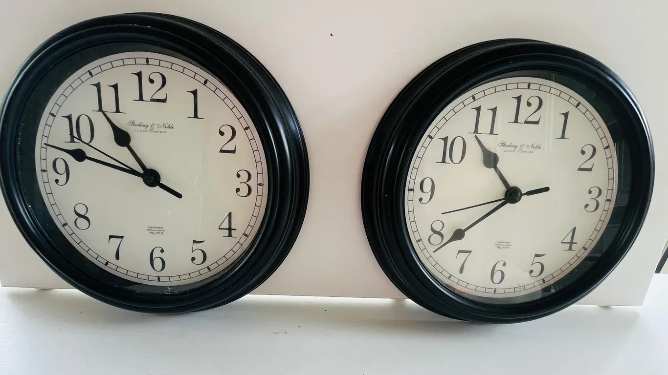 Pair of Sterling & Noble Wall Clocks