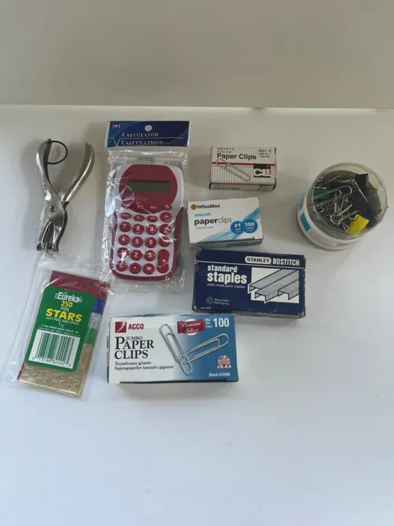Lot of Office Supplies including Calculator, Hole Punch, Paper Clips, and Staples