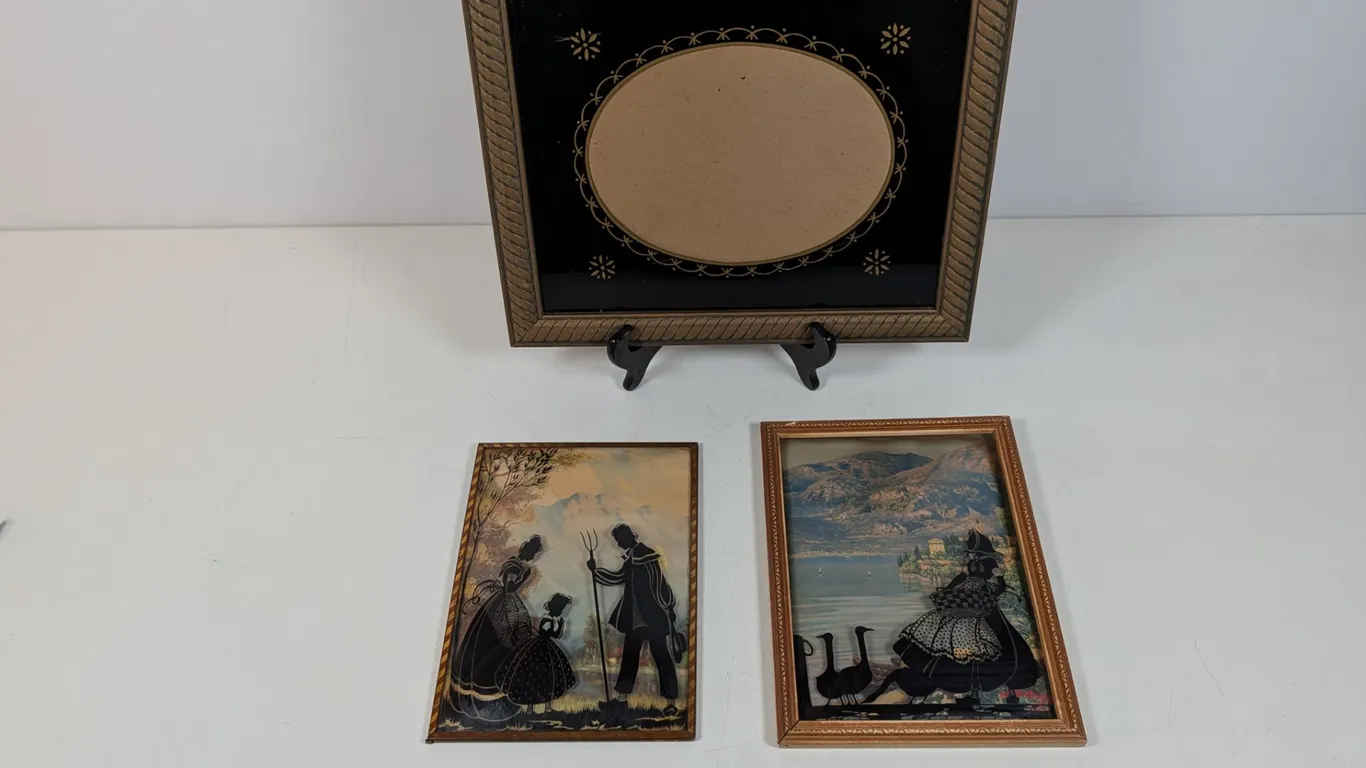 Decorative Frame and Two Silhouette Pictures