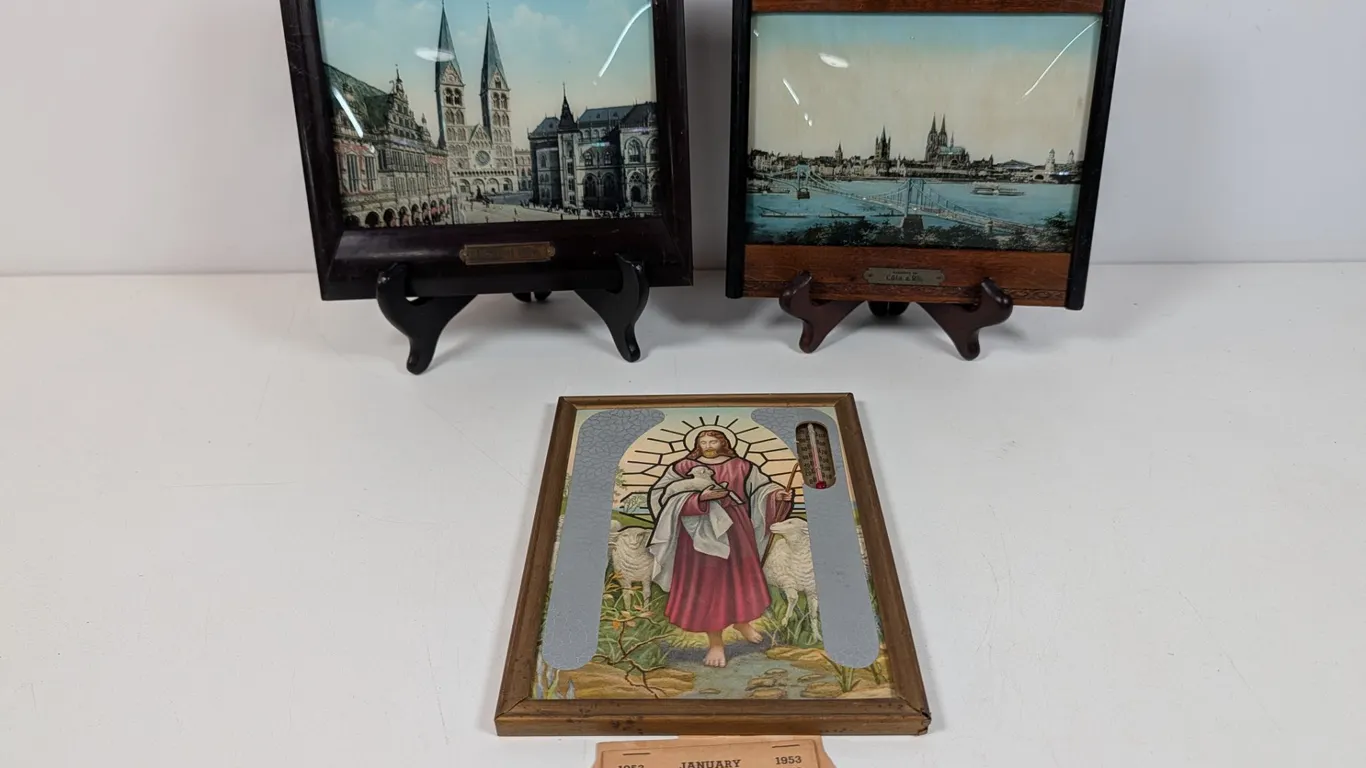 Set of Two Framed German City Views and Jesus Thermometer with Calendar