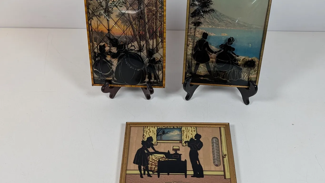 Three Framed Reverse Painted Silhouettes and Thermometer Advertisement