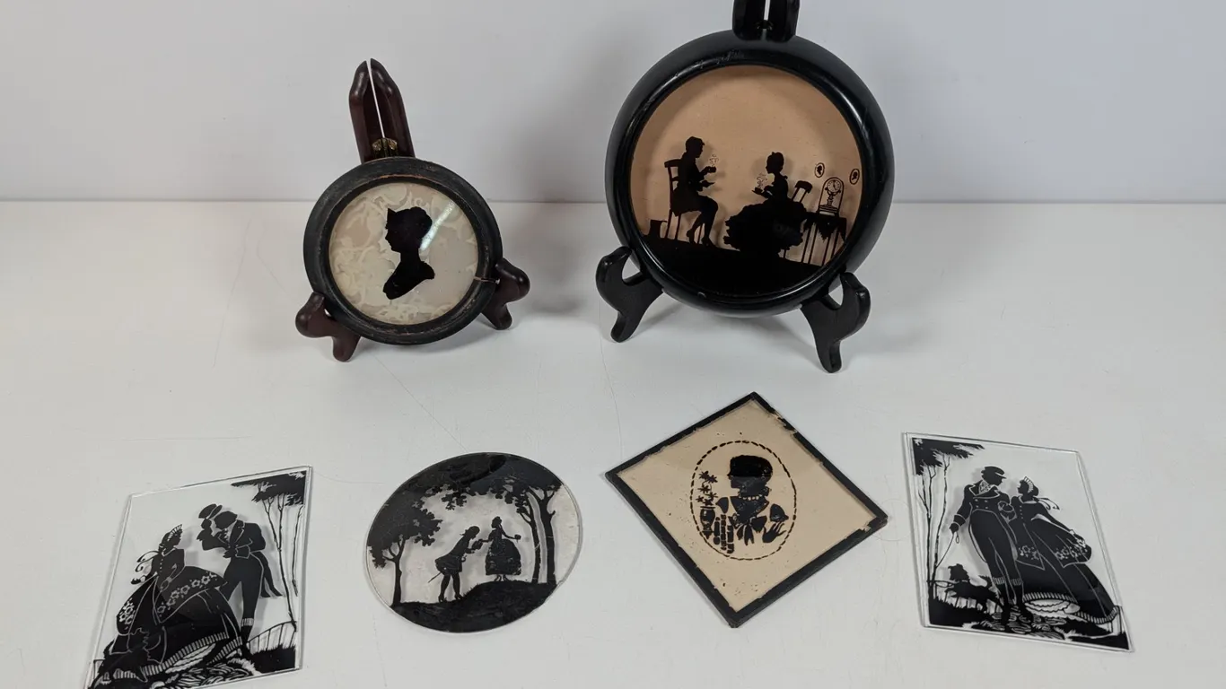 Collection of Silhouette Art and Framed Portraits