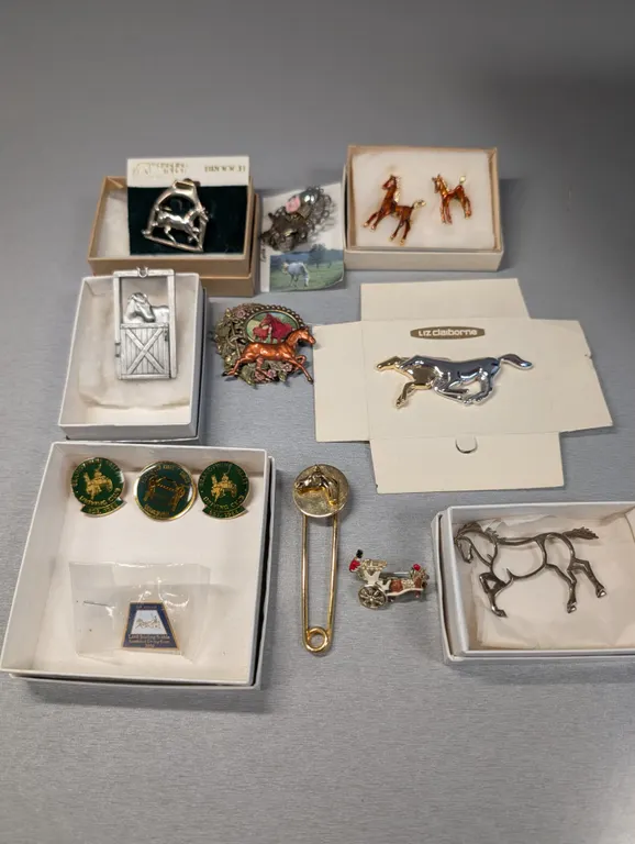 Collection of Horse-Themed Brooches and Pins