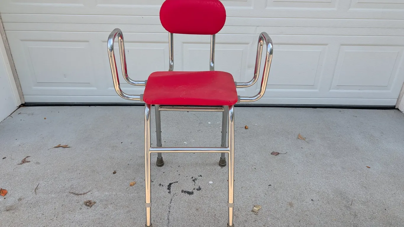 Adjustable Chrome and Red Upholstered Chair