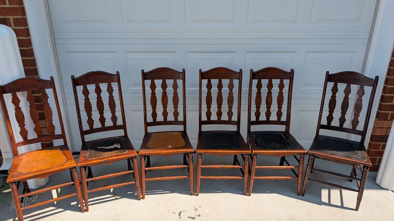 Set of Six Wood Dining Chairs with Embossed Seats