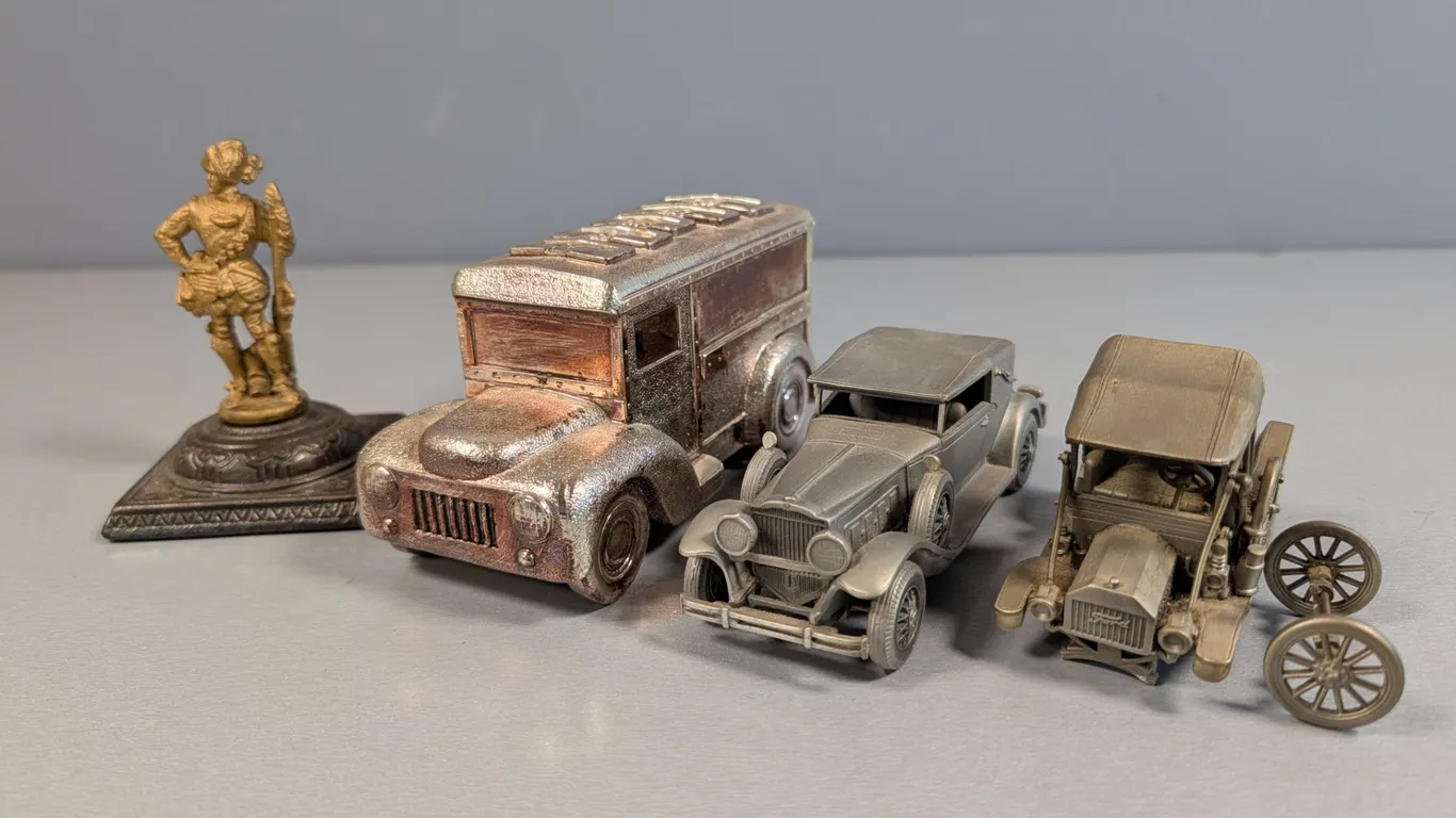 Metal Vehicle Collectibles with Cast Iron Figural Base