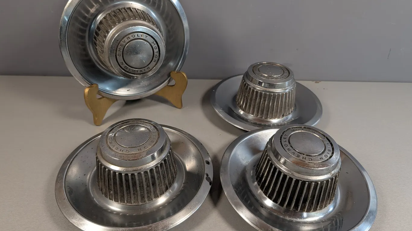 4 Chevrolet Motor Division Hubcaps