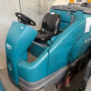 TENNANT T16 HEAVY-DUTY BATTERY-POWERED RIDE-ON FLOOR SCRUBBER DAMAGED STEERING TIRE - FOR PARTS/