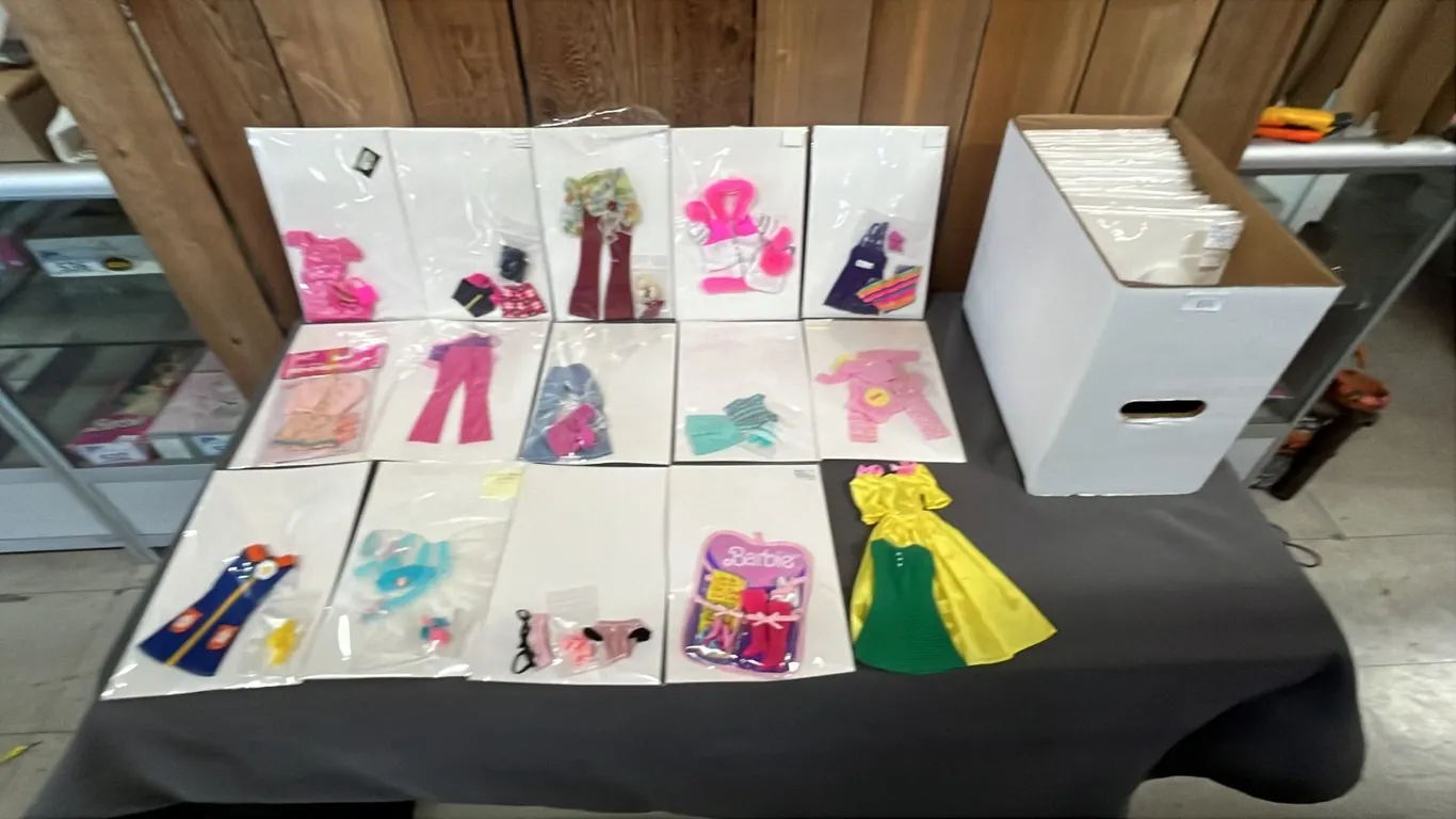 BOX OF ASSORTED VINTAGE BARBIE CLOTHES