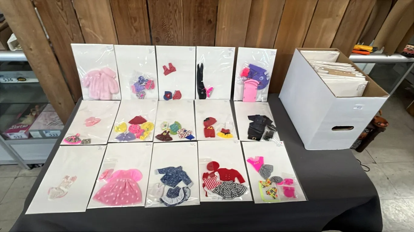 BOX OF ASSORTED VINTAGE BARBIE CLOTHES