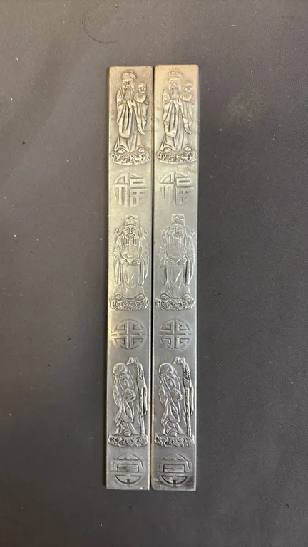 PAIR OF DEITIES PAPER WEIGHTS
