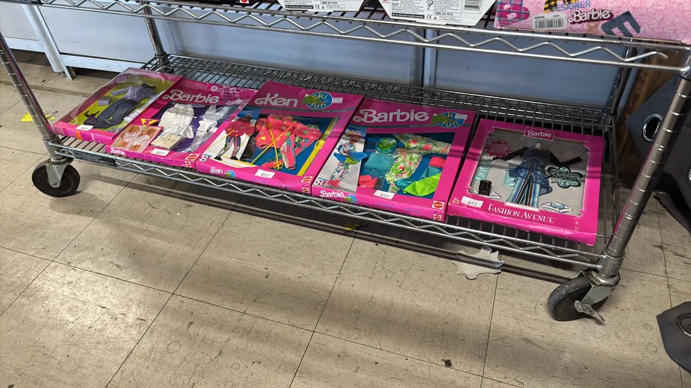 SHELF OF ASSORTED VINTAGE BARBIE & KEN CLOTHING *IN ORIGINAL BOXES*