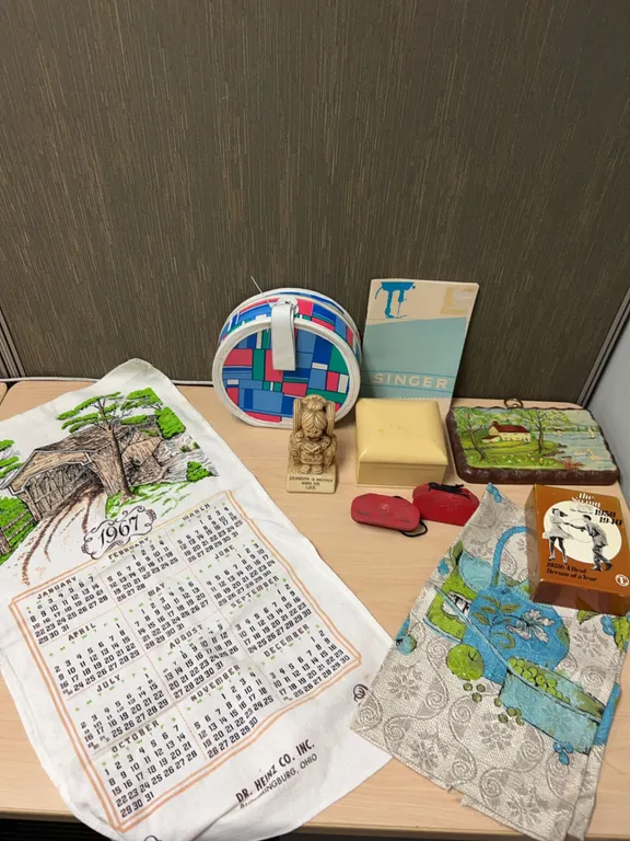 Household and Decorative Items Including Calendar, Box, and Tapes