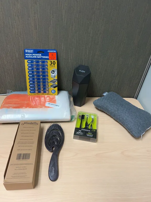 Personal Care And Household Tool Assortment Including Batteries