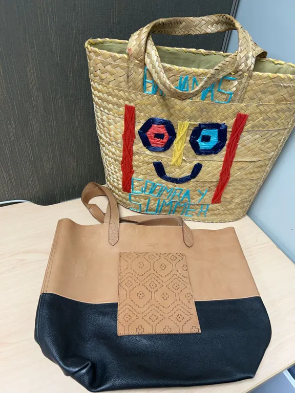 Two Tote Bags: Trades of Hope Leather and Bahamas Straw