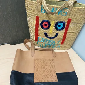 Two Tote Bags: Trades of Hope Leather and Bahamas Straw