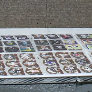 17 Pages of Football Cards Featuring Emmitt Smith, Brock Purdy, Clyde Edwards-Helaire