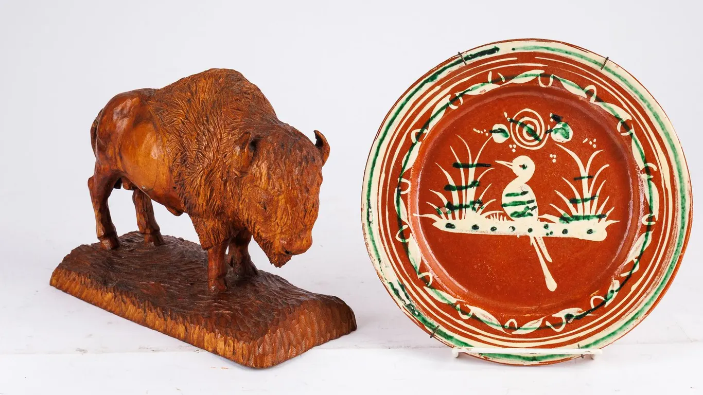 A Vintage Mexican Tlaquepaque Bandera Redware Pottery Plate and A Wooden Bison Figurine.