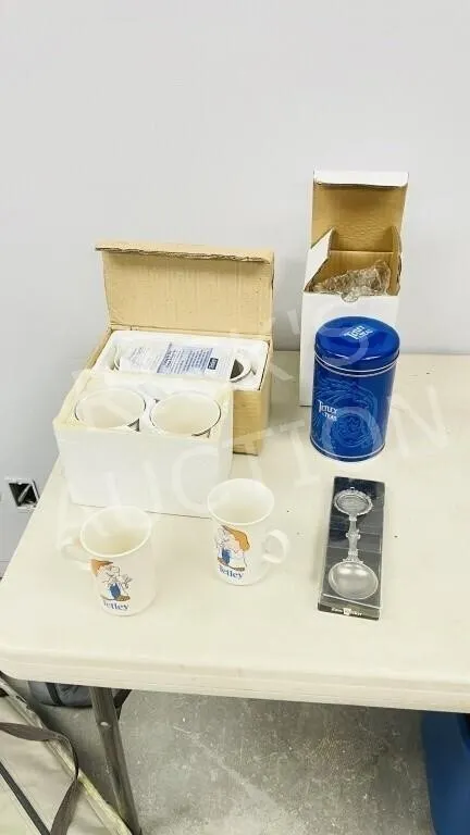 assorted Tetley Tea mugs & teabag tin