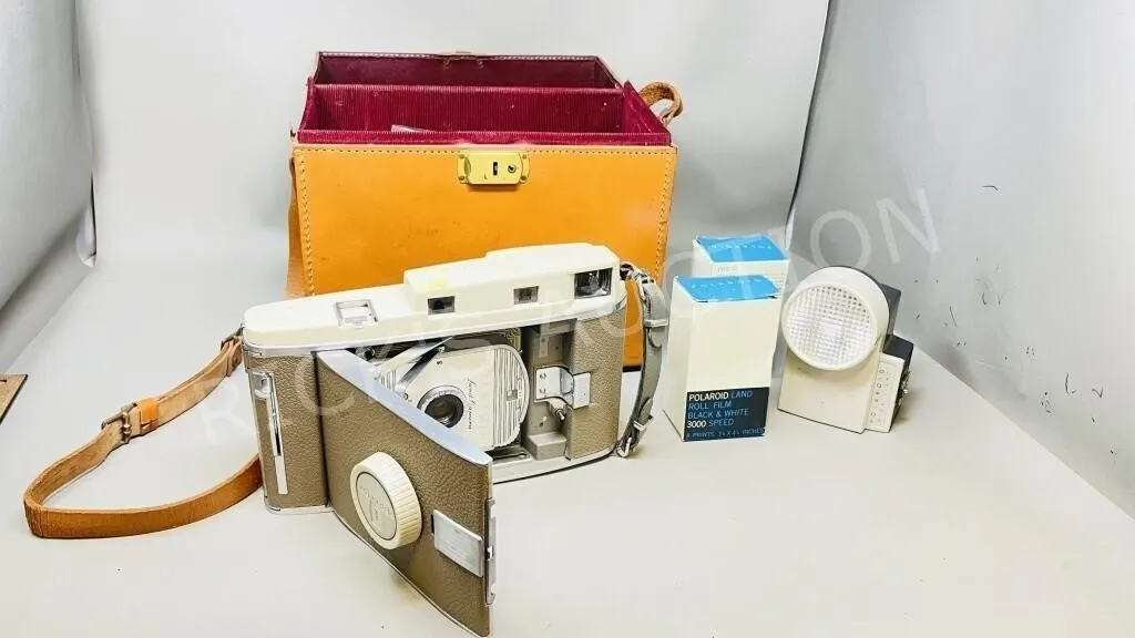 vintage Polaroid kit in original leather case