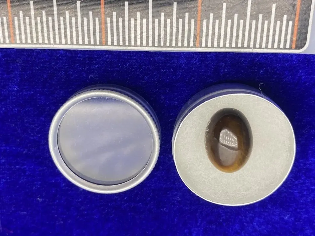 Two Round Cabochon Gemstones