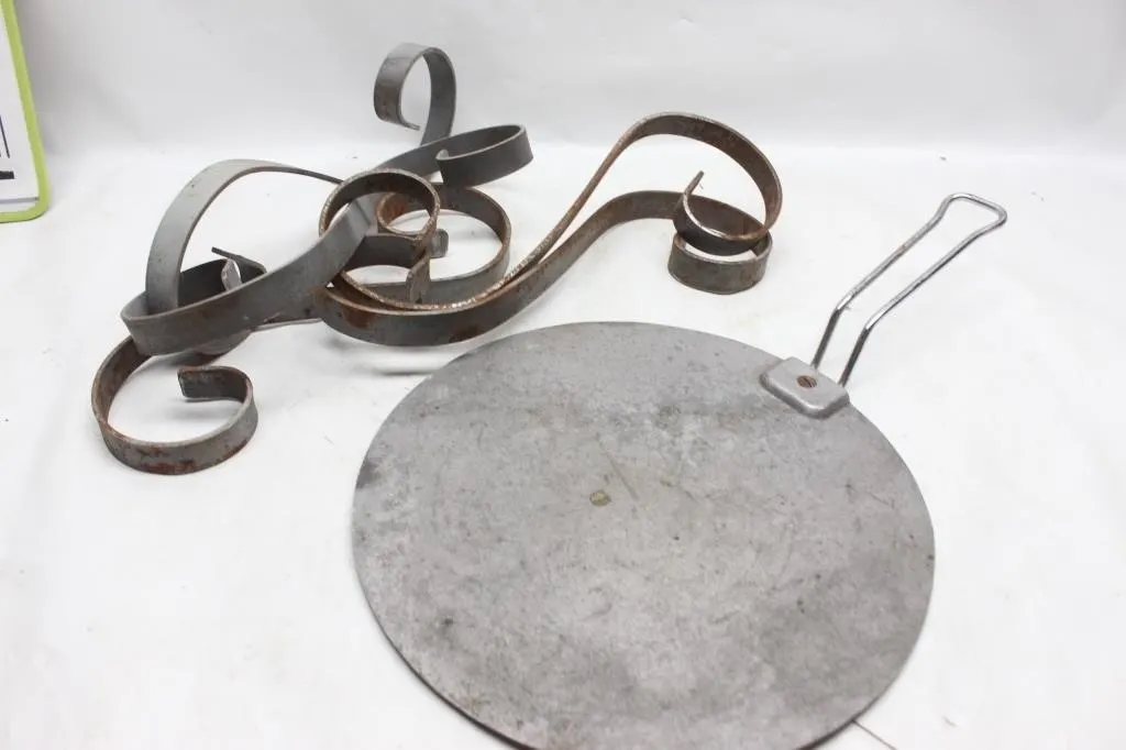 Metal Disc Stand with Decorative Scroll Base