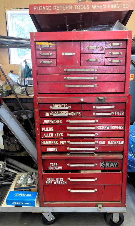 Gray Rolling Tool Chest With Extensive Mechanic and Machinist Hand Tools