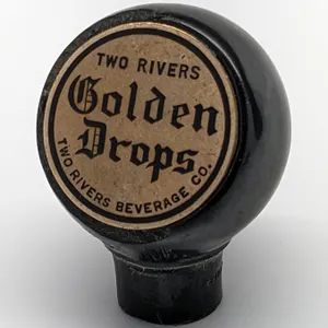 BALL TAP KNOB HANDLE GOLDEN DROPS BEER TWO RIVERS WISCONSIN (GREEN DUCK)