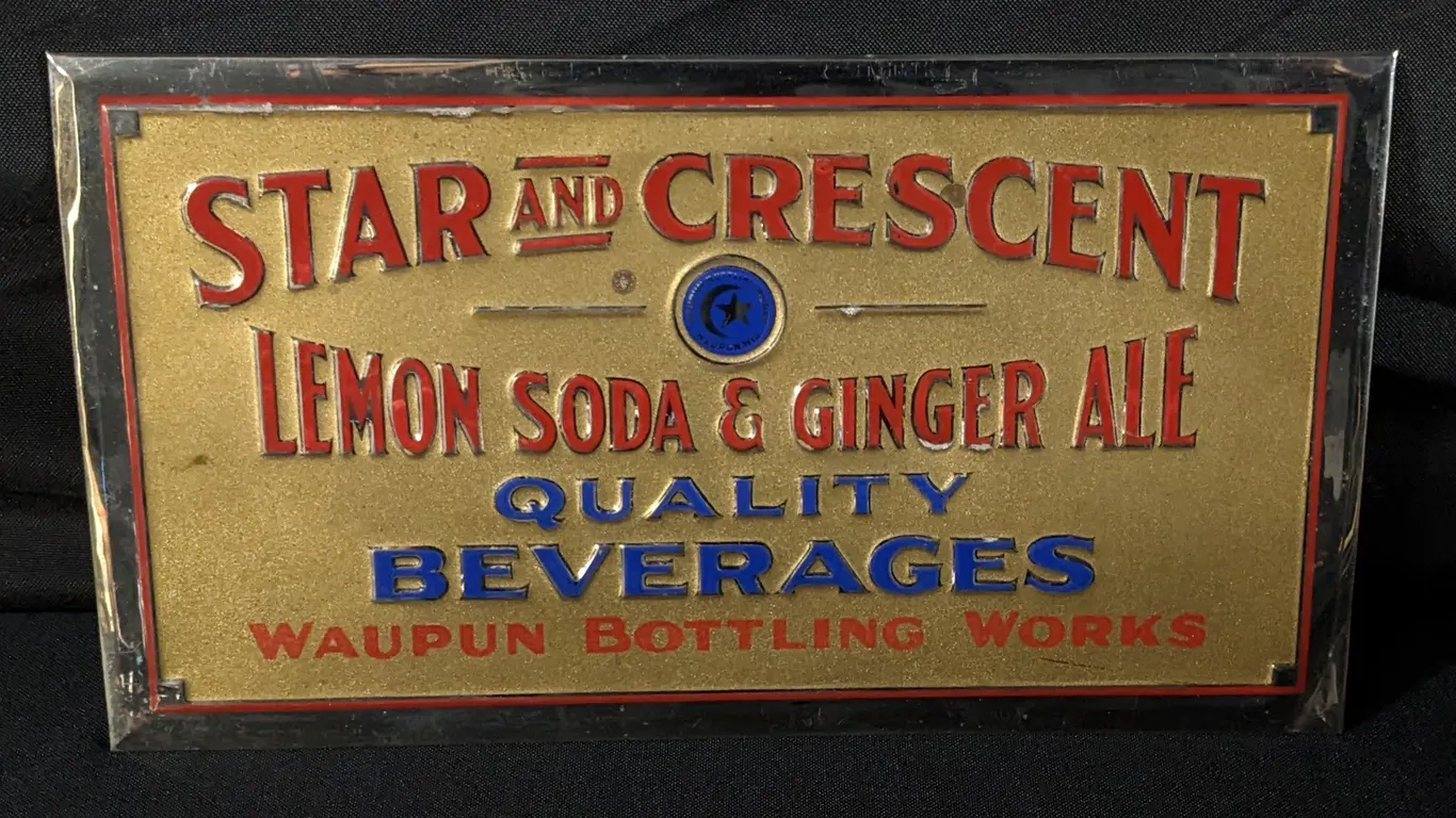 STAR & CRESCENT LEMON SODA & GINGER ALE WAUPUN BOTTLING CO WISCONSIN KEMPER THOMAS EMBOSSED ALUMINUM SIGN