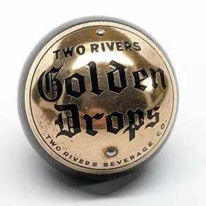 BALL TAP KNOB HANDLE GOLDEN DROPS BEER TWO RIVERS WISCONSIN (DAKA-WARE)