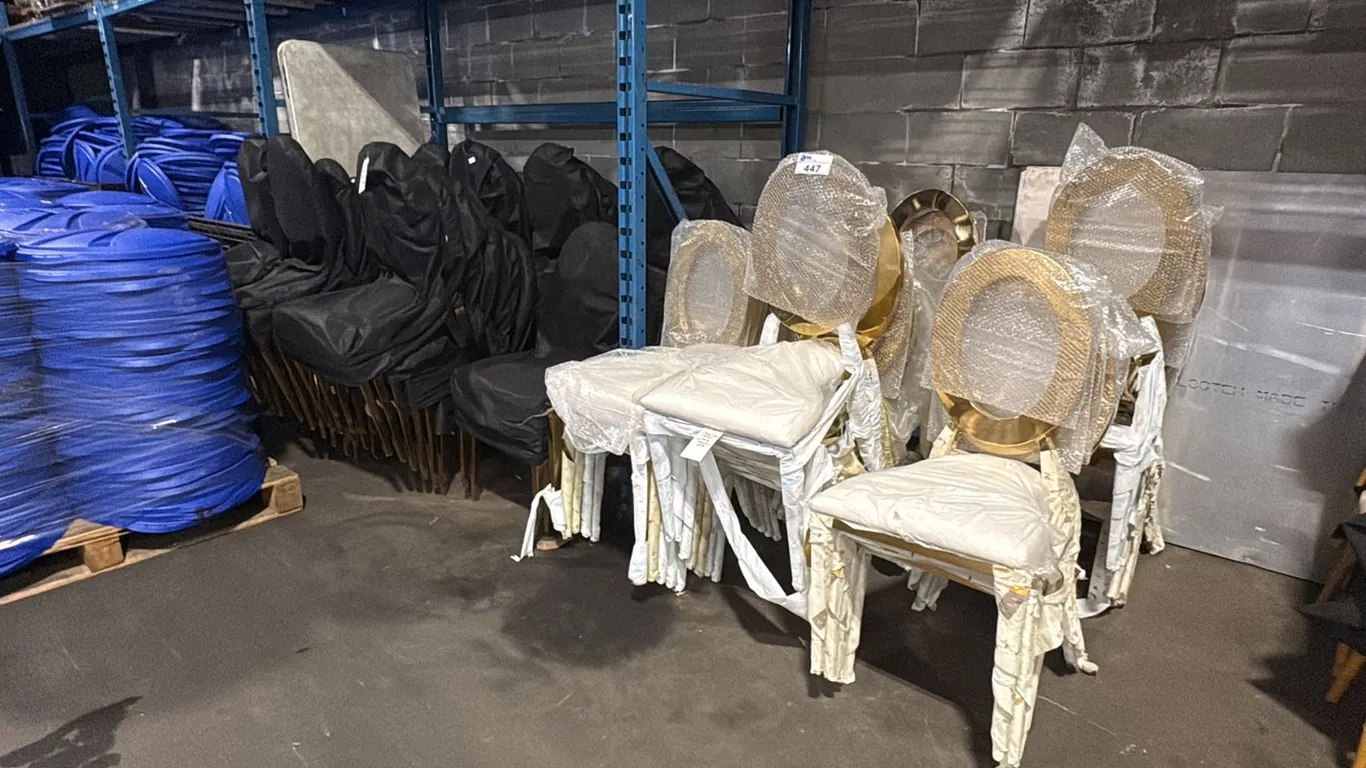 14 STACKS OF METAL GOLD FRAMED STACKING EVENT CHAIRS WITH BIN OF CUSHIONS, APPROX 80 CHAIRS
