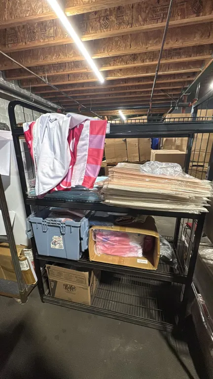 GROUP OF ASSORTED BABY THEME BOXES, TABLE COVERS/BLANKET COVERS *RACK NOT INCLUDED*