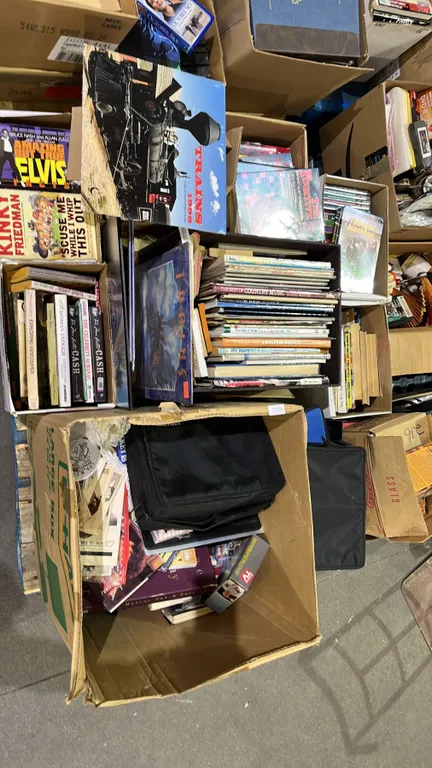 PALLET OF ASSORTED BOOKS AND CD HOLDER CASES