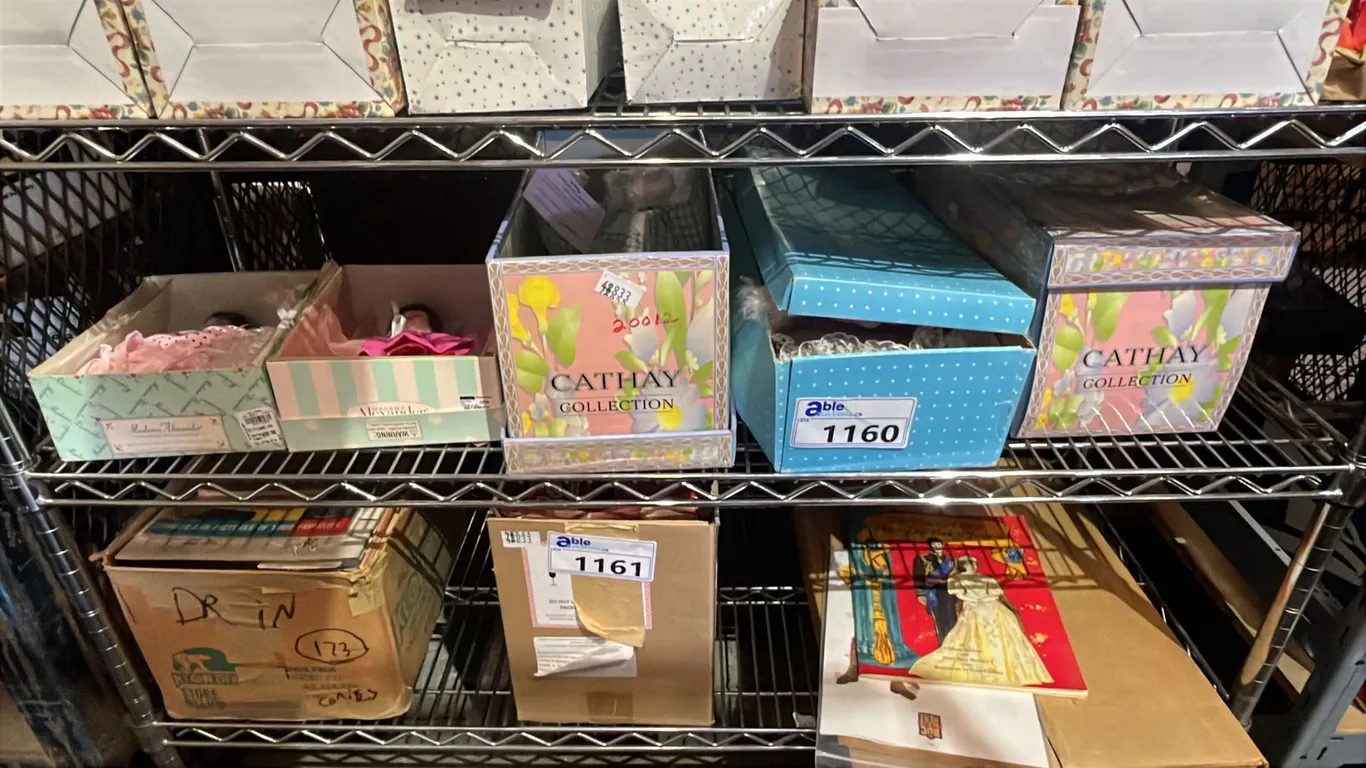 SHELF LOT OF ASSORTED DOLLS INCLUDING MADAME ALEXANDER , CATHAY COLLECTION AND MORE