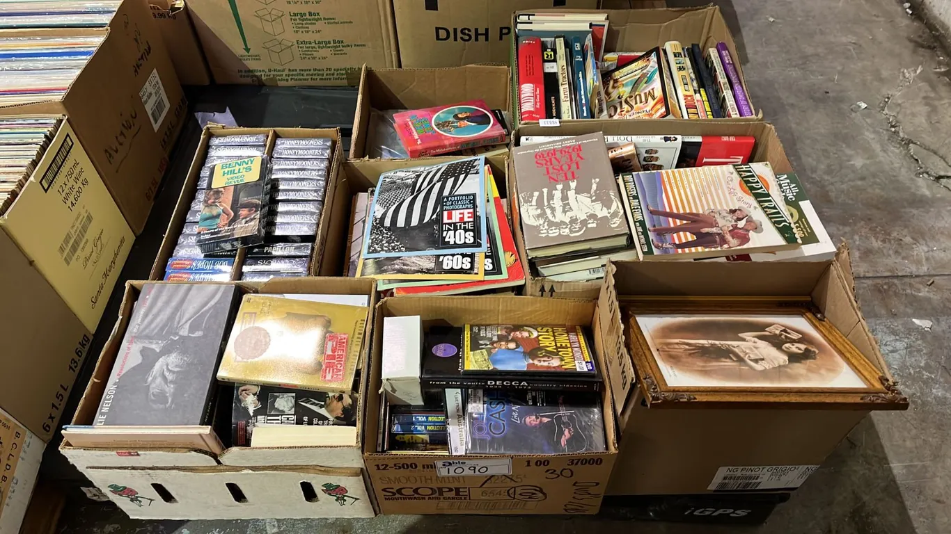 PALLET OF ASSORTED BOOKS, DVD'S AND VHS TAPES