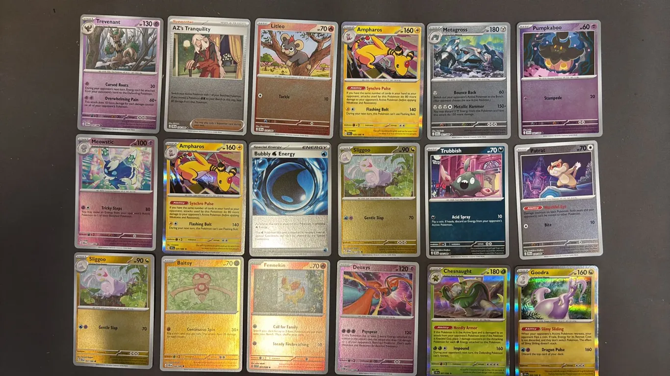 STACK OF ASSORTED POKEMON CARDS