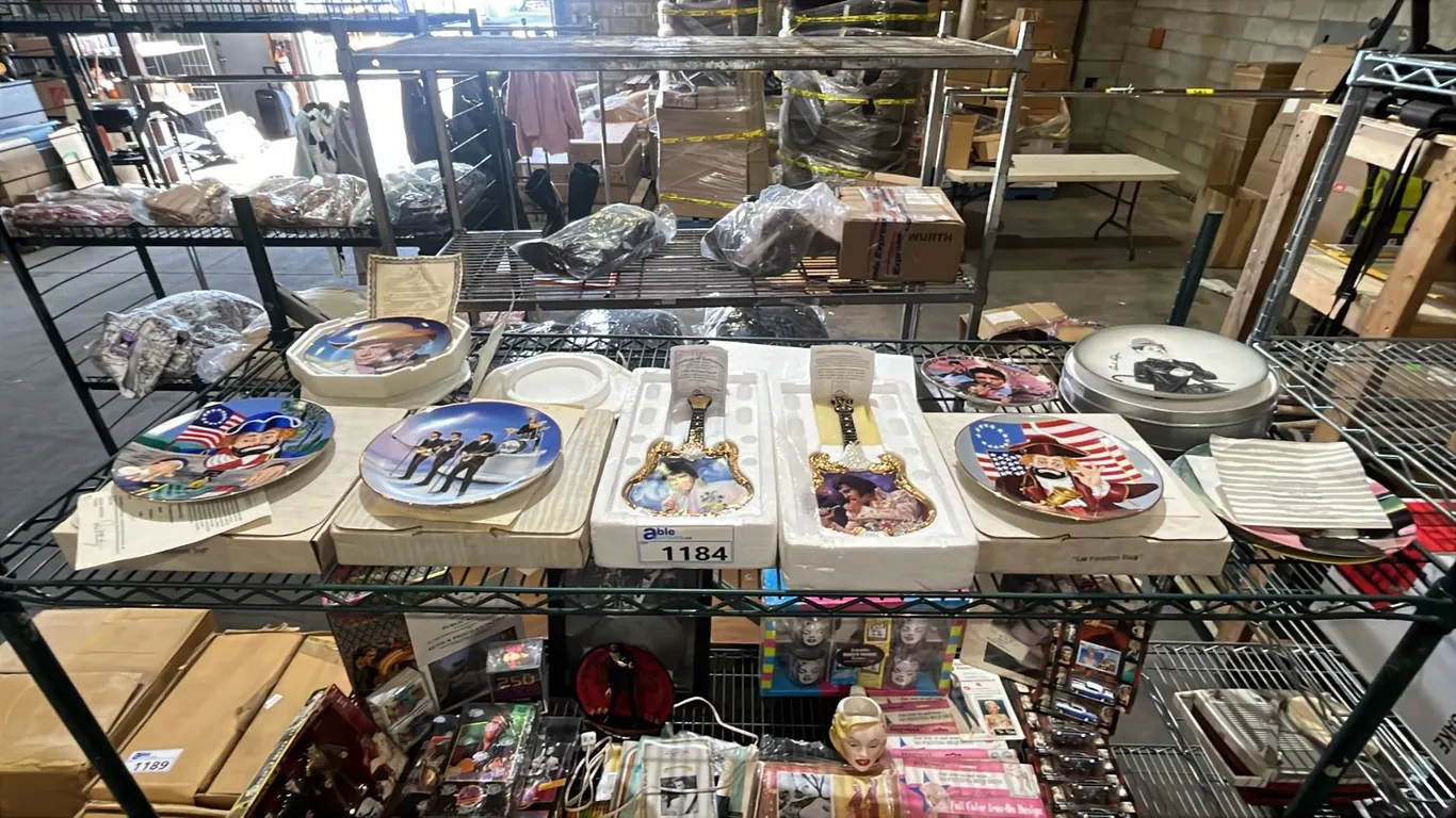SHELF OF ASSORTED COLLECTABLE PLATES WITH BOX