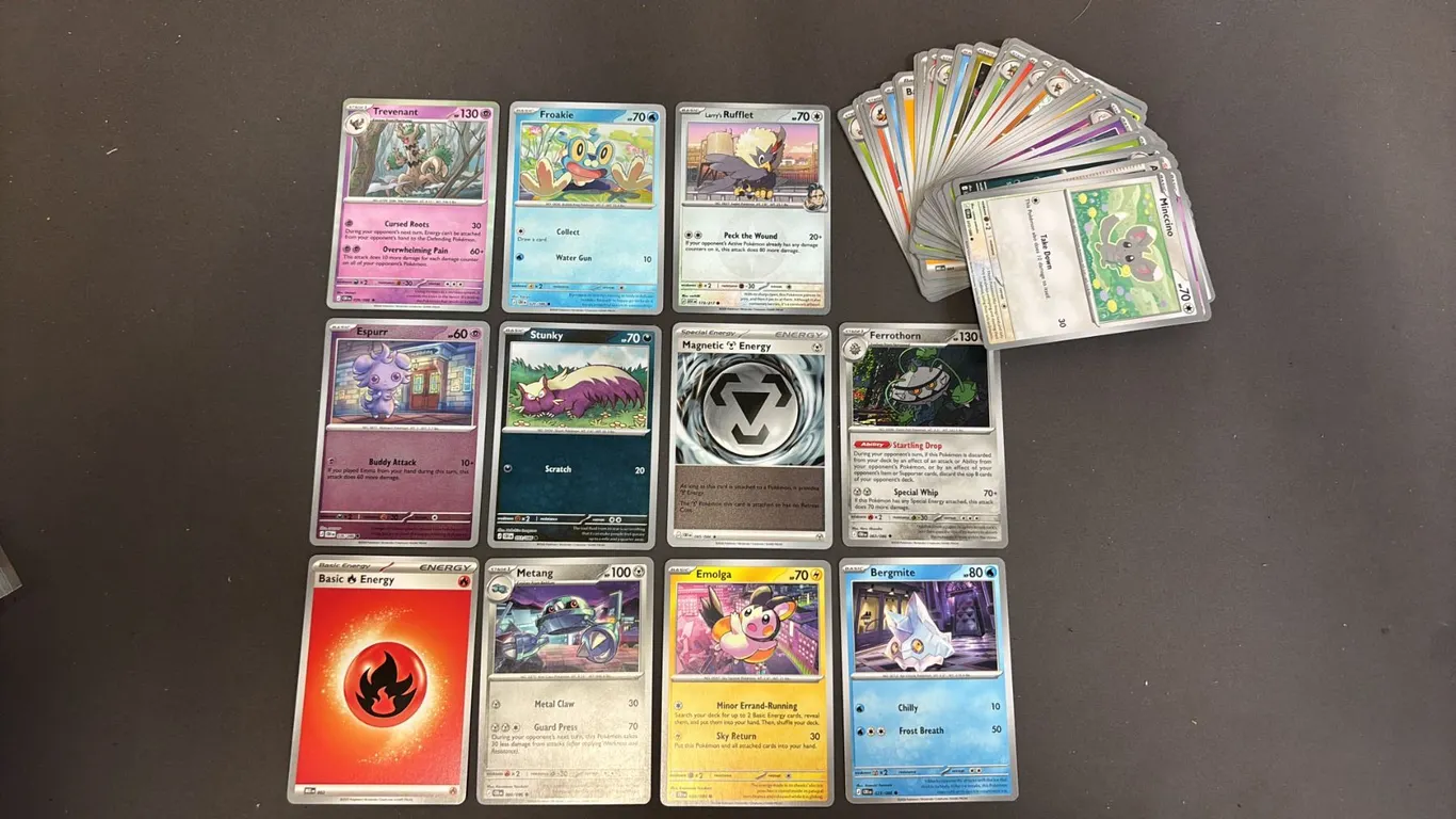 STACK OF ASSORTED POKEMON CARDS