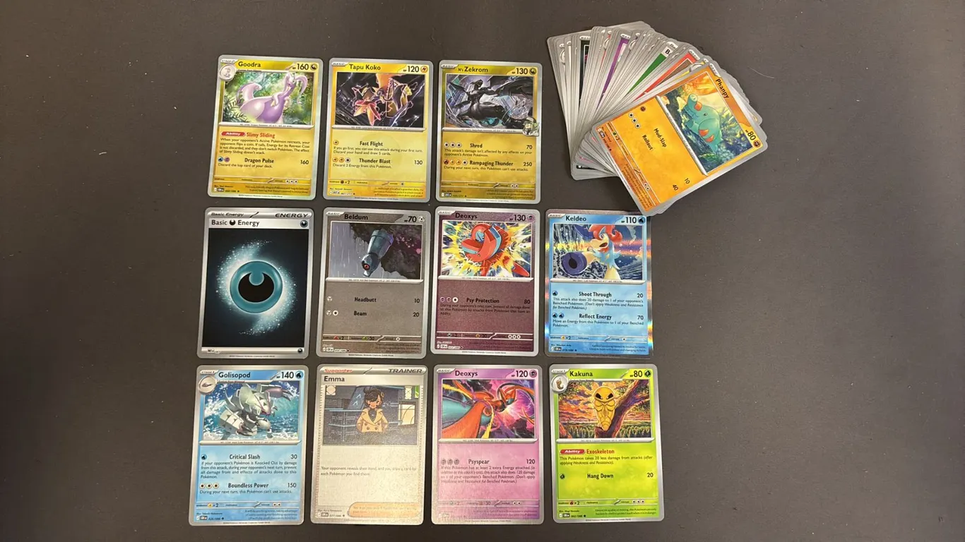 STACK OF ASSORTED POKEMON CARDS