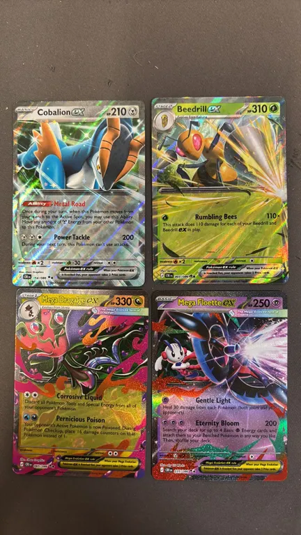 (3) ASSORTED POKEMON CARDS