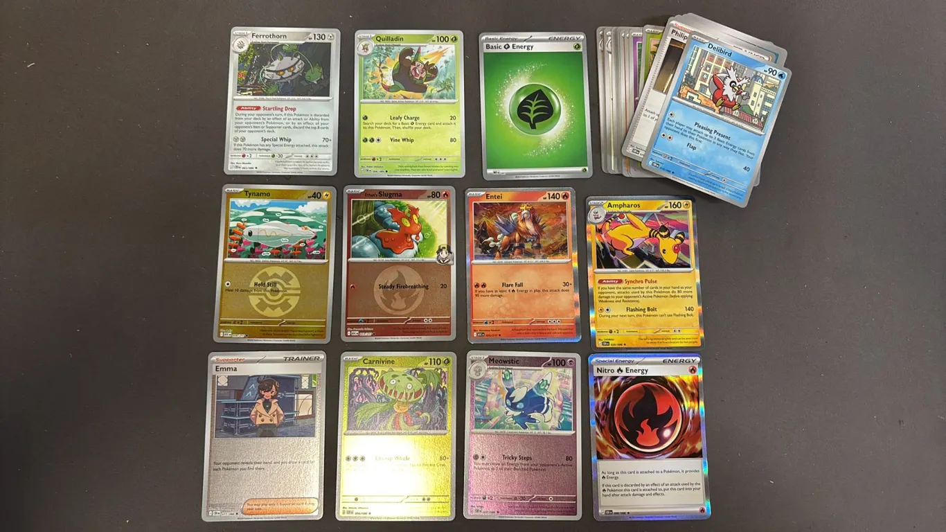 STACK OF ASSORTED POKEMON CARDS