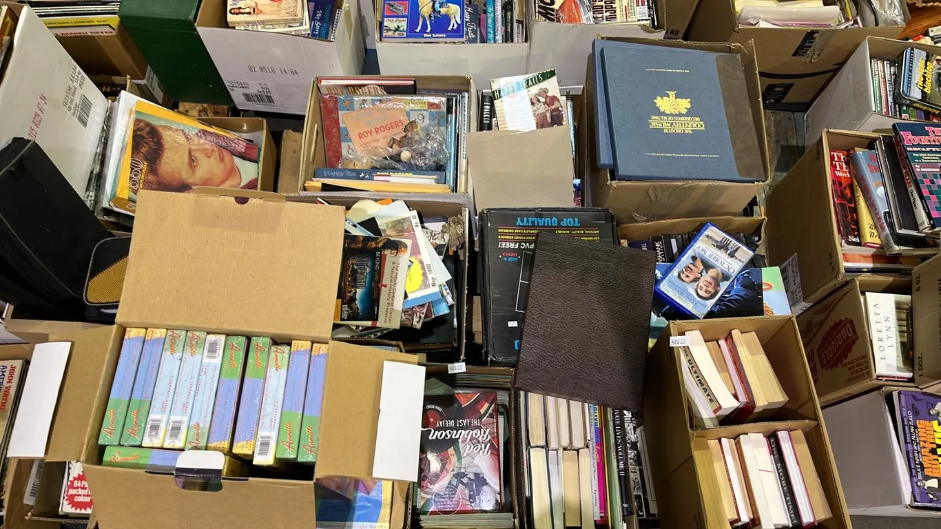 PALLETS OF ASSORTED BOOKS, VHS TAPES, CASSETTES AND MORE