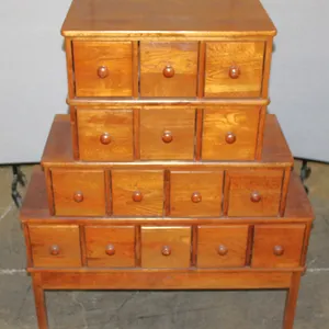 Tiered Wood Apothecary Cabinet With Drawers