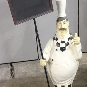 Chef Figure with Chalkboard Sign