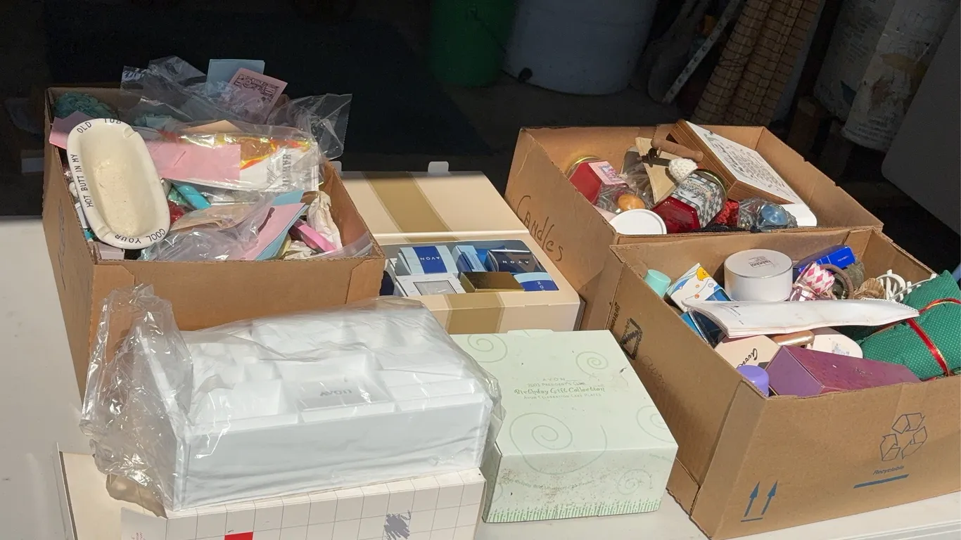 Four Boxes of Avon Items