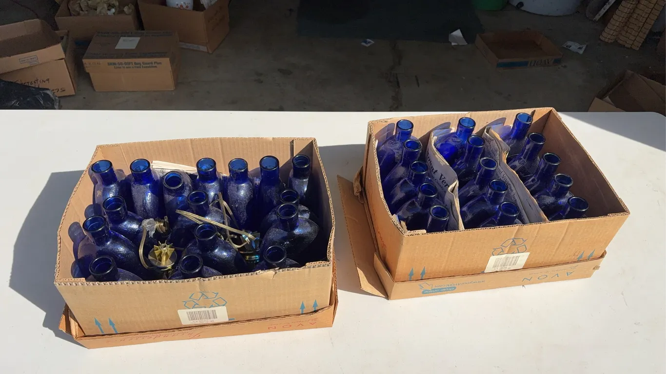 31. Cobalt Blue Commemorative Bottles.