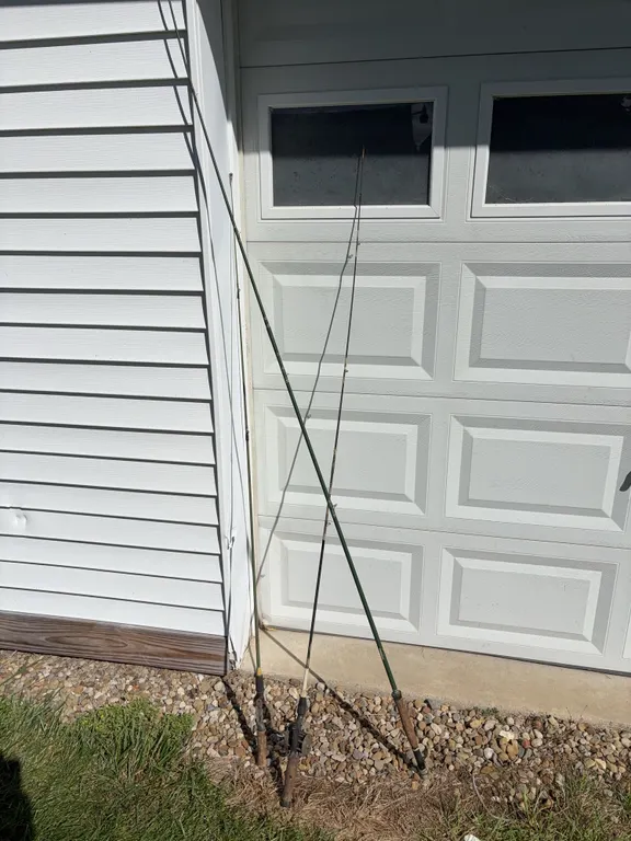 Three Vintage Fishing Rods and One Reel