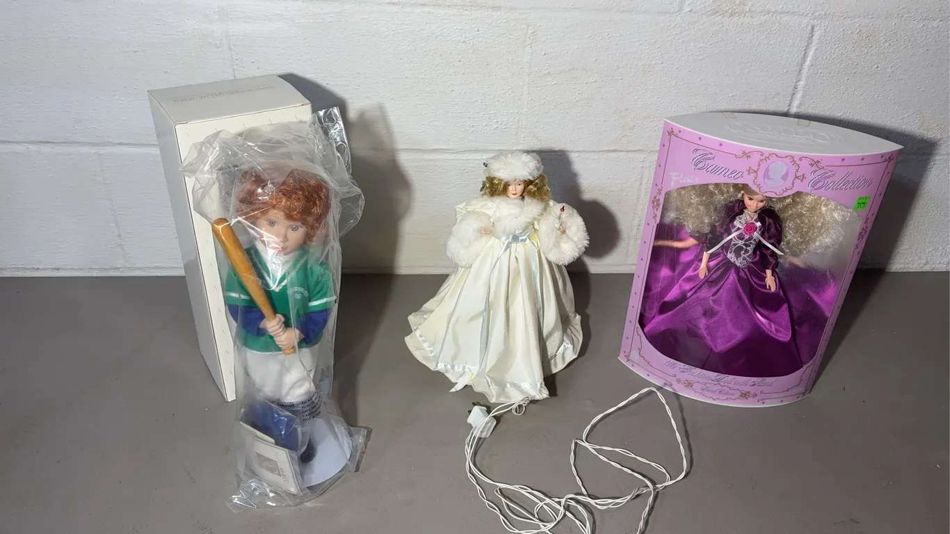 Three Dolls