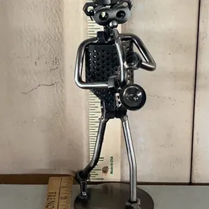 Metal Art Man Playing Instrument 9.75" Tall